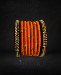 ORANGE BLACK SILK THREAD BANGLES